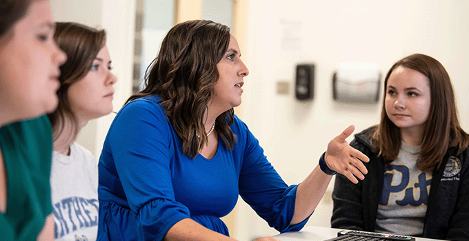 Students and Professor discussing
